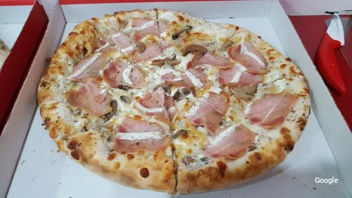 Photo by Pollos y Pizzas Ortiz