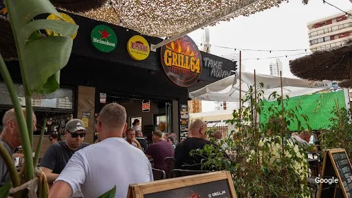 Foto de Grill 64
