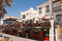 The Trinity Irish Bar, restaurante en Chipiona